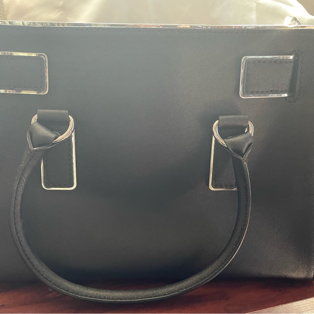 Rare Michael Kors black/silver purse.